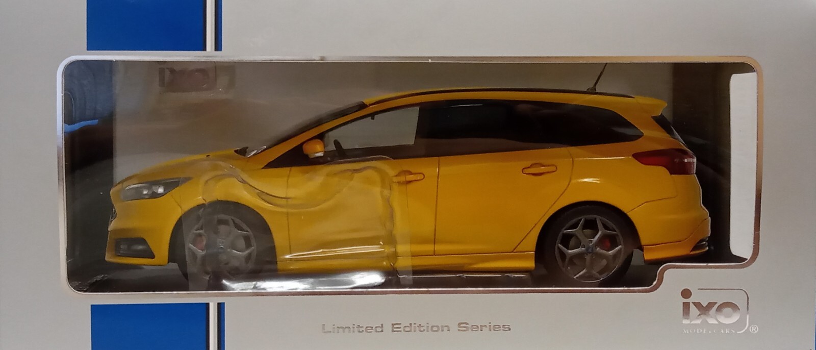 IXO 1/18 Scale - Ford Focus ST Estate (2015) Sunset Yellow