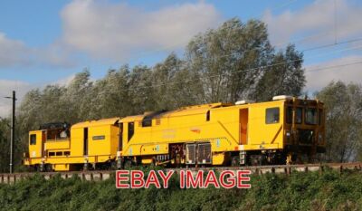 PHOTO  DR30301 STEPHEN CORNISH NETWORK RAIL STONEBLOWER AT RIVENHALL  BEAUTIFUL