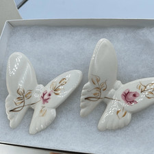 Vintage Lasting Products Inc.  hand painted butterfly wall hangings.