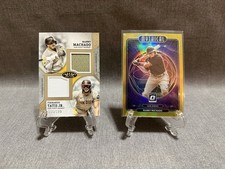 Manny Machado 2021 Optic Gold 9/10. Machado & Tatis 2024 Dual Jersey 115/199.