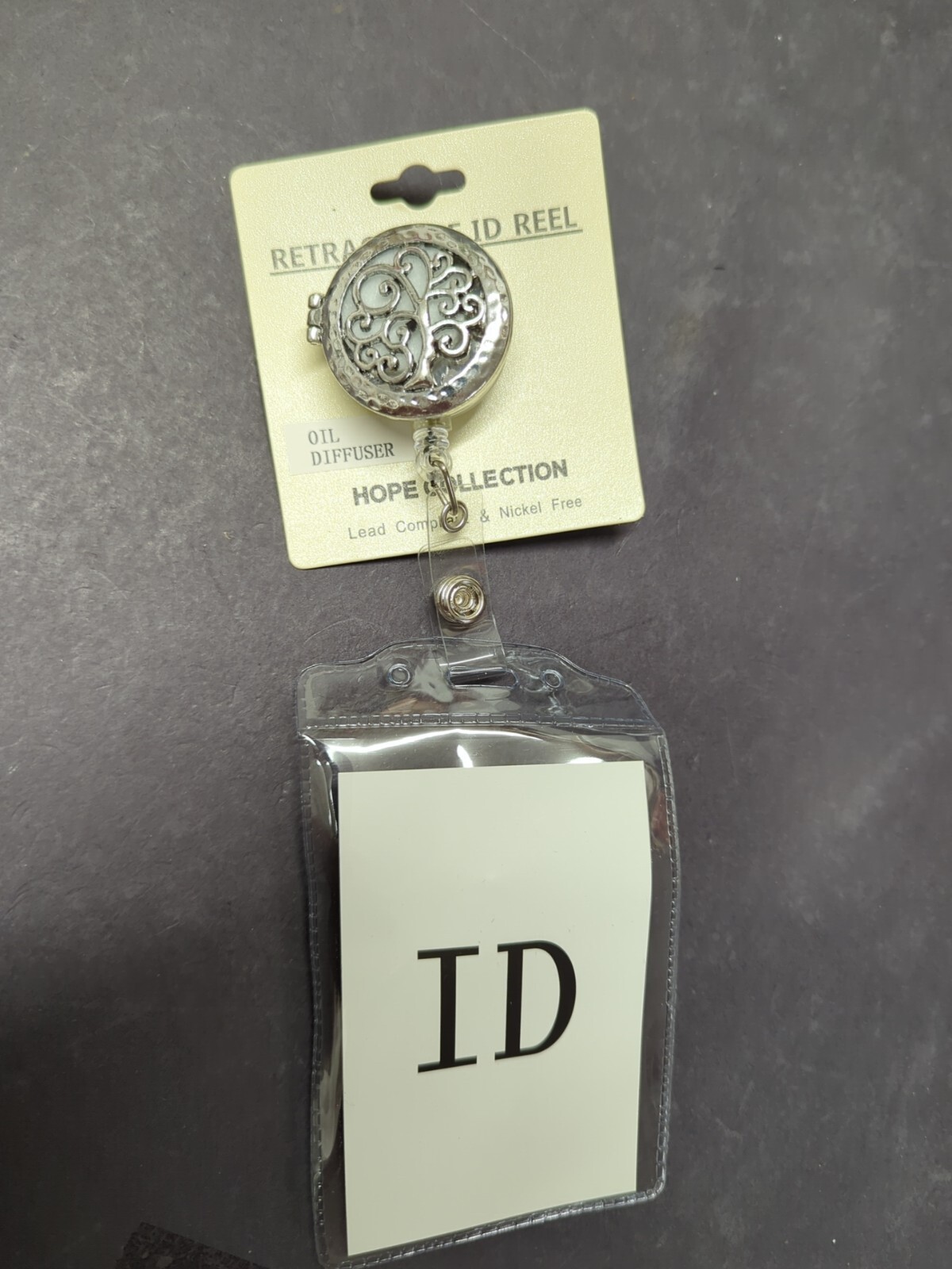 Retractable ID Badge Holder with Essential Oil Diffuser and Lanyard Clip-image
