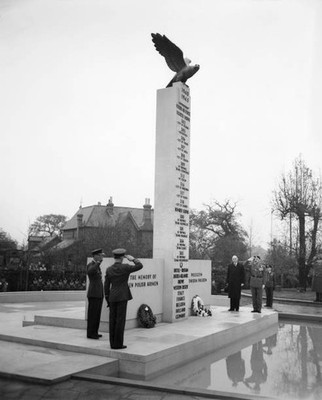 Servicemen taking salute as a monument to Polish airmen who died d- Old Photo
