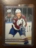 2025-26 Upper Deck Series 1 Holiday Edition Nathan MacKinnon 