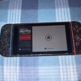 Nintendo Switch Console with Black, Red & Blue Joy-Con, USB-C