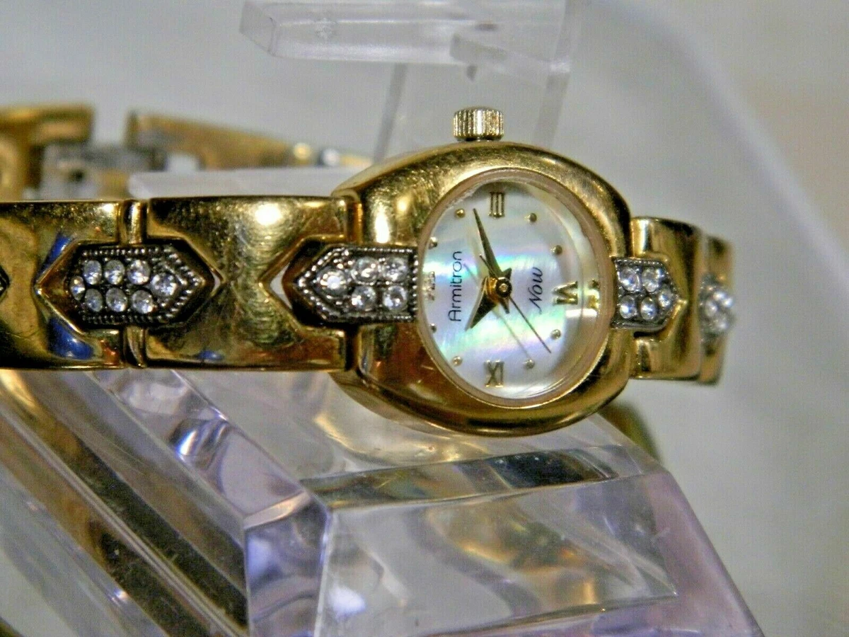 Women s Gemmed Armitron Now Mother of Pearl Watch. New Battery. 2