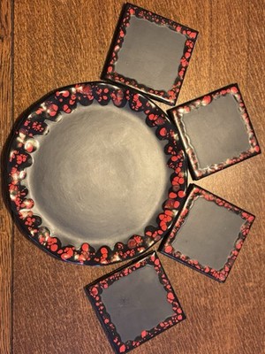 Signed Black With Lava Glaze Signed Plate And Coaster Set