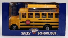 2001 NIB The Chevron Cars Sally School Bus Plastic Yellow Collectible School Bus