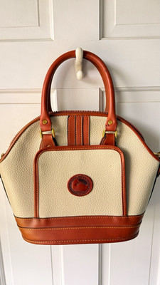 Vintage Dooney & Bourke All-Weather Leather dome satchel in classic cream/ivory