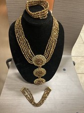 Mojisola Adeola Gbadamosi-Sanni 5 Strand Jewelry Set. Necklace, 2 Bracelet.