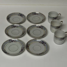 bone china made in Japan 3 -2 1/4" small tea cups and 6 -4 3/8" saucers unmarked