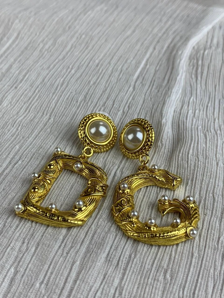 Золотые серьги с жемчугом Dollec & Gabbana DG - Изображение 2 из 4