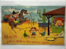 VINTAGE MULCIN VITAMINS UNUSUAL ADVERTISING JIGSAW PUZZLE by MEAD WESTERN COWBOY