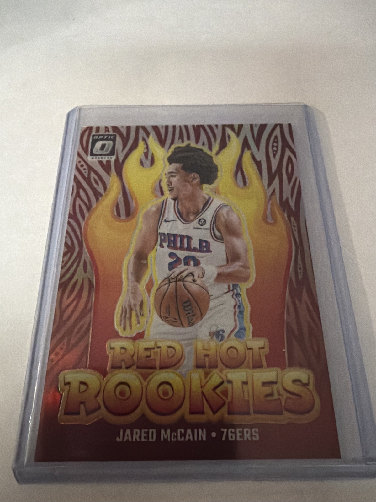 2024-25 Donruss Optic Jared McCain Red Hot Rookies Holo #12 Philadelphia 76ers