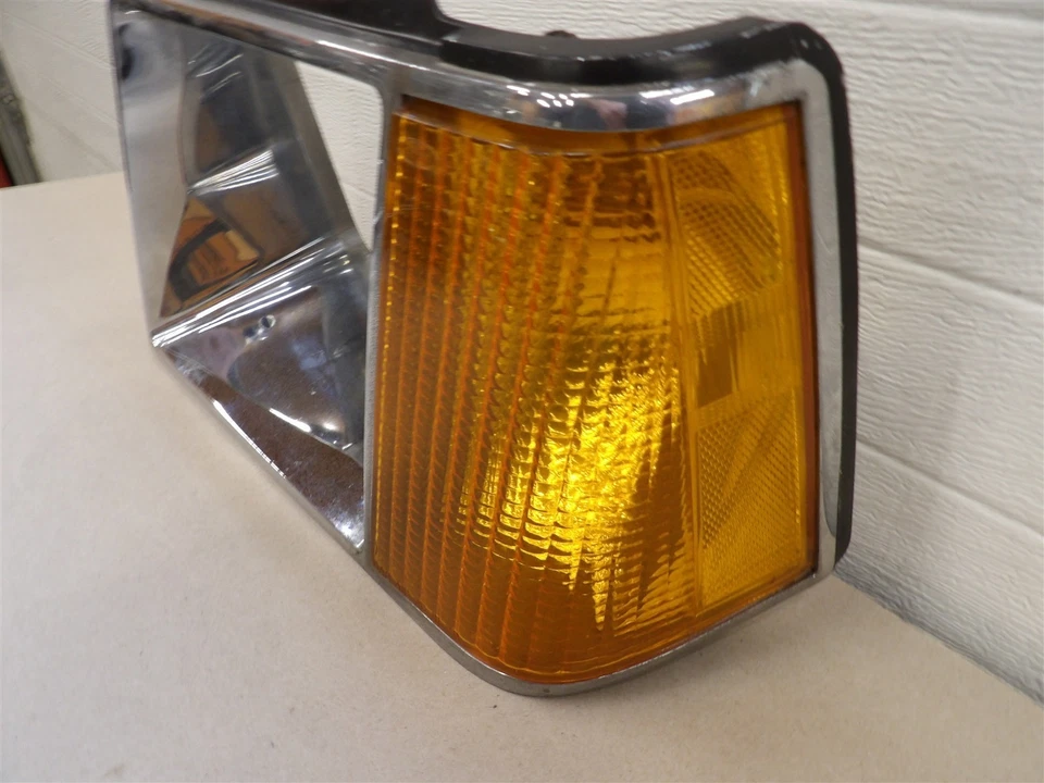 FORD ESCORT MERCURY LYNX 1981-1985 LH FARO LATERAL BISEL CROMADO OEM Foto 2 de 4