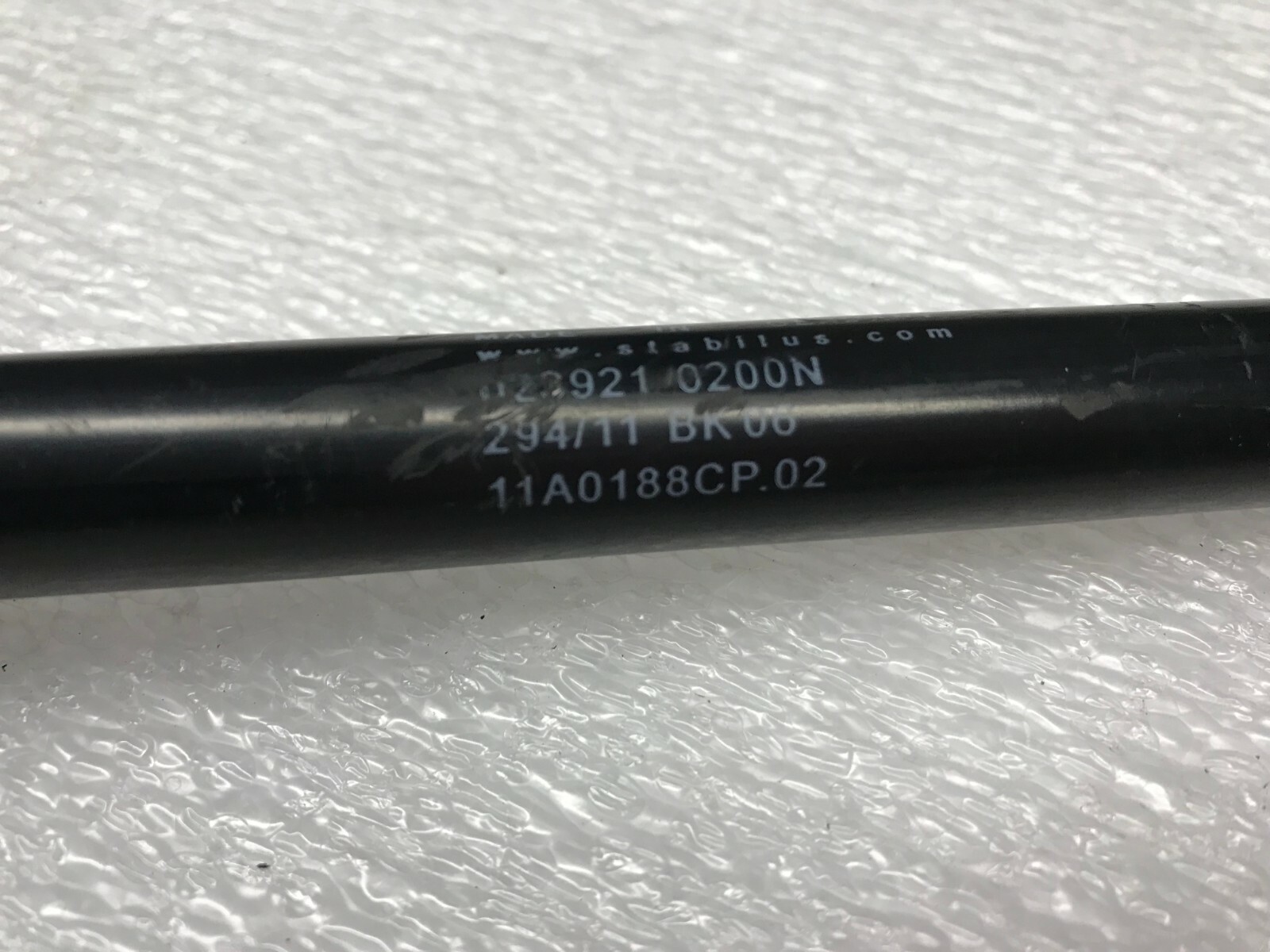 MCLAREN MP4-12C GAS SPRING SHOCK WITH BRACKET OEM 11A0188CP