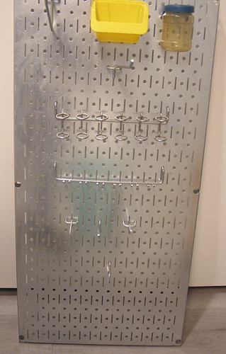 Metal Pegbolard with Hooks and Bins Monted