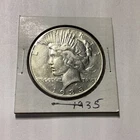 1935 $1 Peace Dollar XF TO AU. Silver. Breaking high grade set. Lovely.