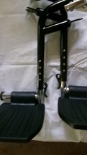 WHEELCHAIR BLACK PAIR OF FOOTRESTS FOR TRAVEL CHAIR - FOLD FOR EASY STORAGE NEW