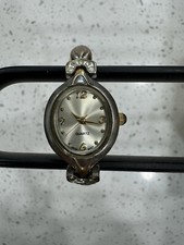 Ladies Silver Tone Dial Oval Case Crystal Accent Link Bracelet Band Watch