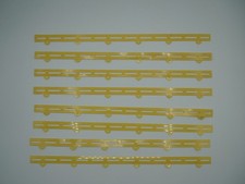 AURORA AFX GUARD RAILS - 8 PC  FOR SLITTED TRACKS  LIGHT YELLOW - VG-EXC COND