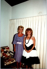 1980s Women Posing Indoors in Dresses with Curtain Backdrop Vintage Photo
