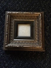 ornate vintage bronze and gold picture frame