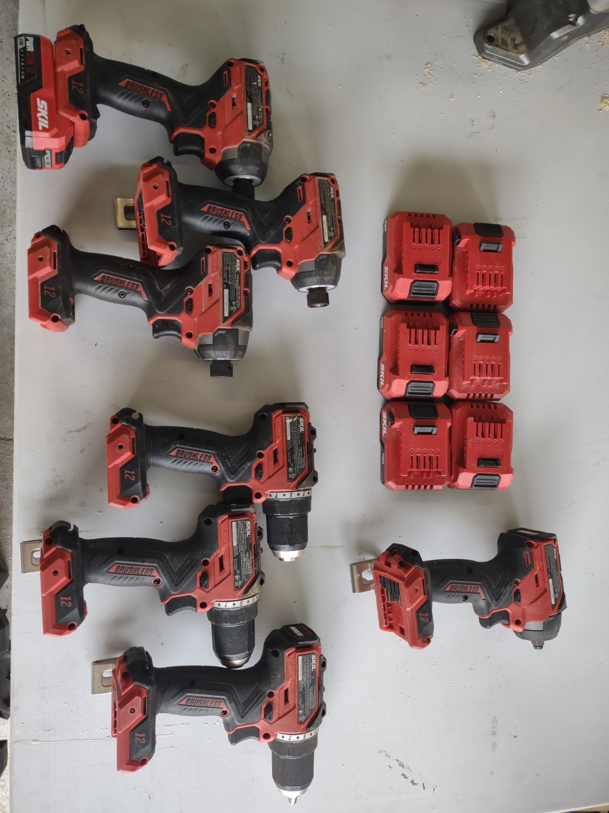 Skil 12v Tools 3 Drills, 3 Impacts, 1-1/2 Drive Impact, 7 Batteries