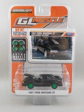 Greenlight CHASE GL Muscle Black 1987 FORD MUSTANG GT w/Extra Wheels  1:64