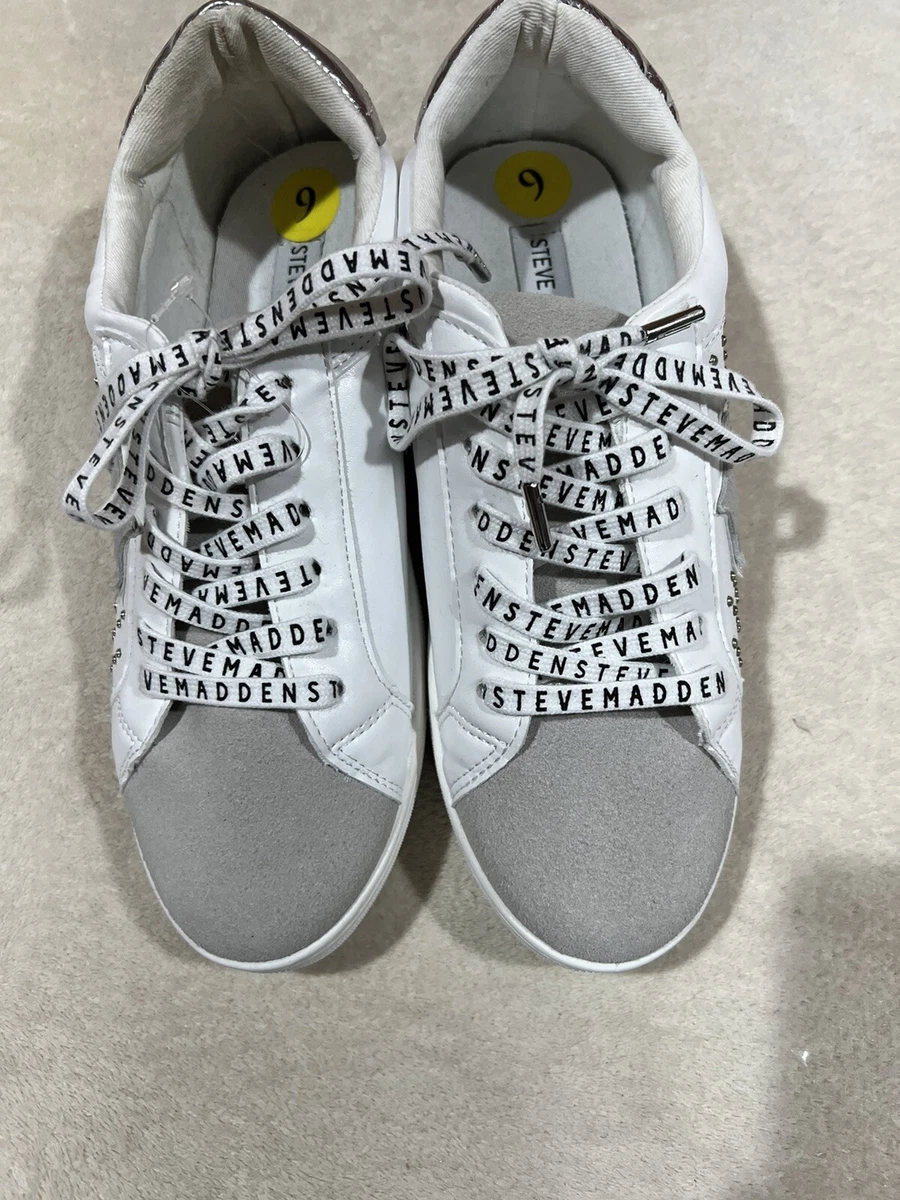 Sneakers with a star on best sale them