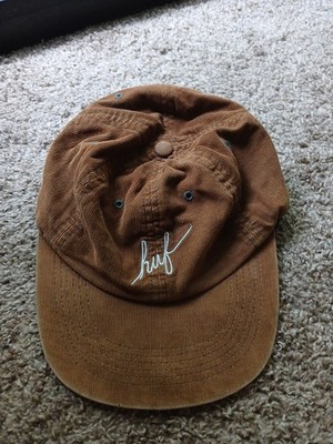Huf Brown corderoy hat. Says Huff on the front and white cursive
