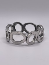 Brazalete elástico asimétrico tono plata LIA SOPHIA “Glacier Bay” “Moon Dance”