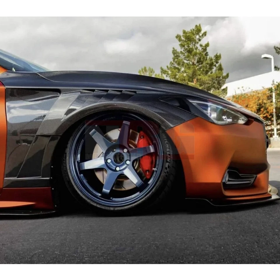 Guardabarros ventilados de fibra de carbono estilo V2 cupé para Infiniti Q60 2016-2022 - Par Foto 2 de 4