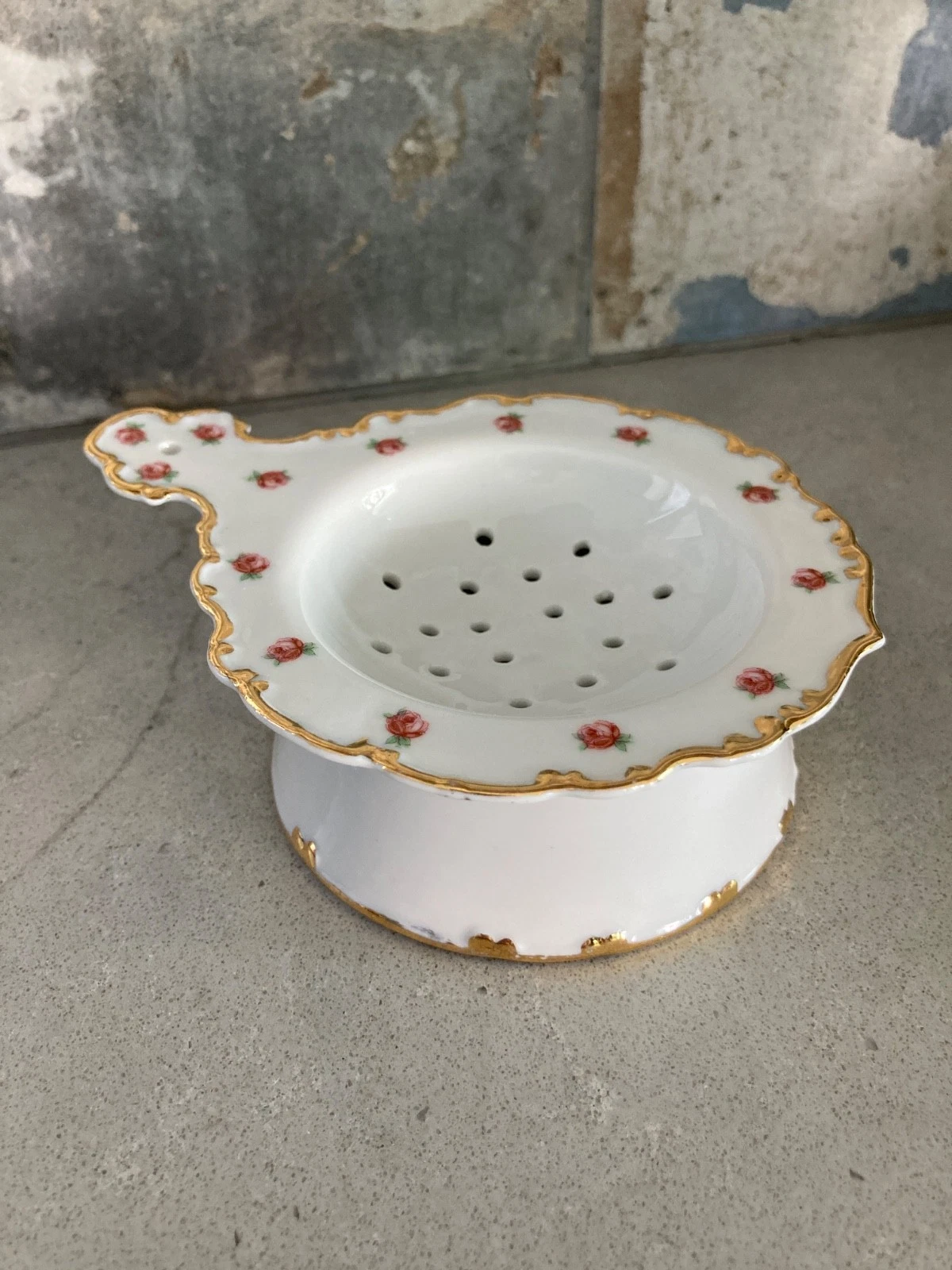 Vintage gold/floral porcelain tea strainer with drip bowl base