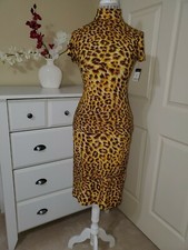 Norma Kamali 2 Pc. Skirt Suit Rust Leopard Zip Mock Neck Top  Midi Skirt Sz.M