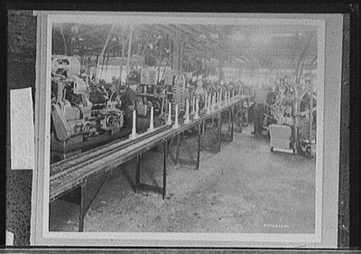 Example,work,brought,men,conveying systems,automobile industrial buildings,1924