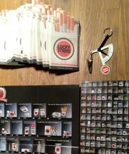 Lucky Strike Merchandise: Briefwaage / 36x Bierdeckel / 2x Jubil&auml;umsposter