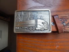 O.C. Tanner Co. 1981 Belt Buckle Solid Brass with hand tooled leather belt Size