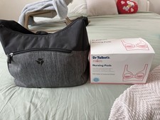 Breast pump with free nursing pads