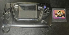 saga gamegear Powers on NO DISPLAY Sold AS IS With Jurassic park