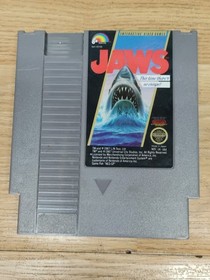 NES Lot Of 7 Games & Game Genie - Beetle Juice, Mario Duck Hunt, Jaws, Tetris 