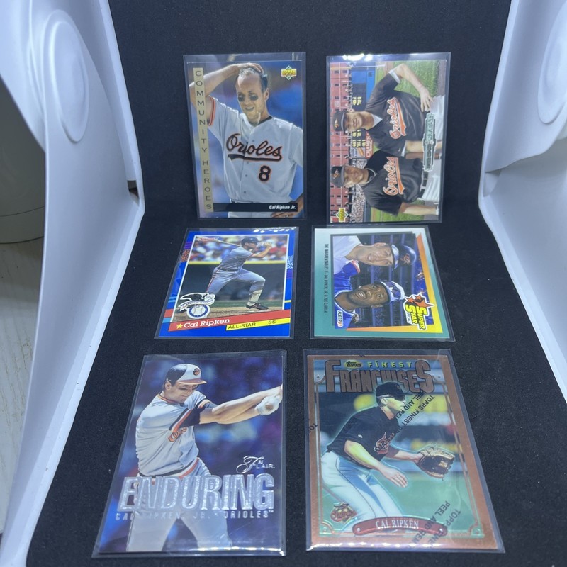 (12) Cal Ripken 90’s Lot + collectable!  Topps, Donruss,Flair, UD & Pinnacle