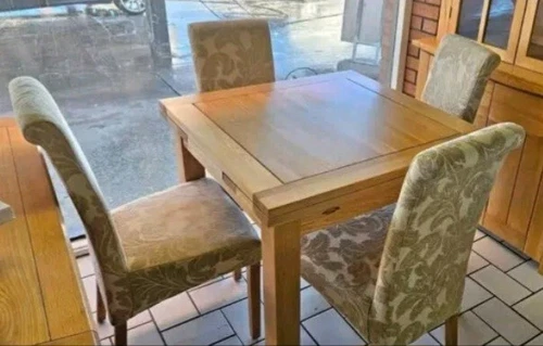 oak furniture land extending  dining table and chairs 