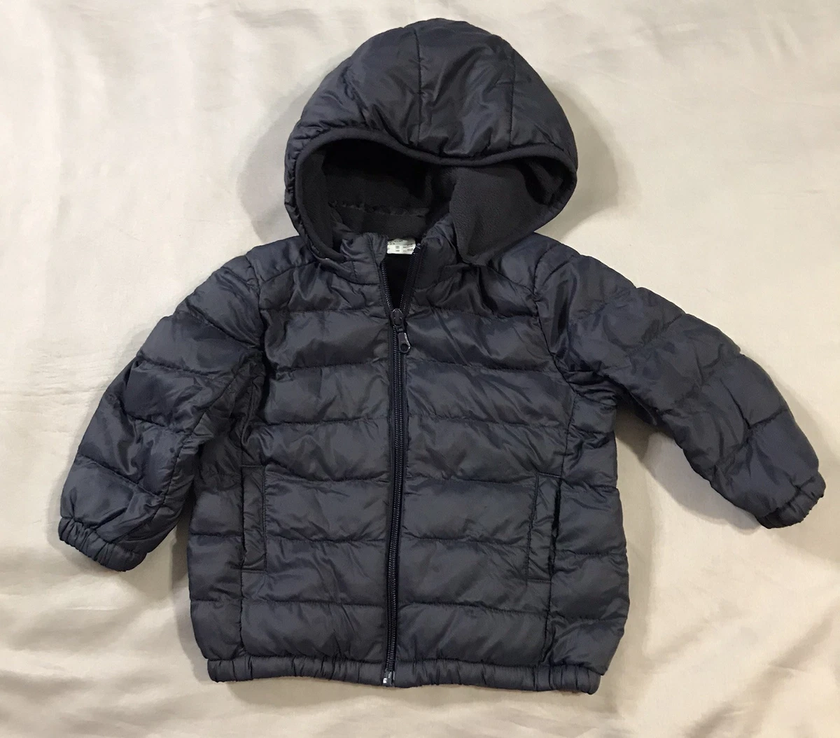 Doudoune Uniqlo Enfant Taille 7-8 Ans - Noire, Matelassée, Capuche - Occasion