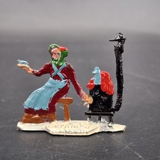 Vintage Heinrichsen German Flat Lead Woman At Stove with Teacup Nuremberg Flat