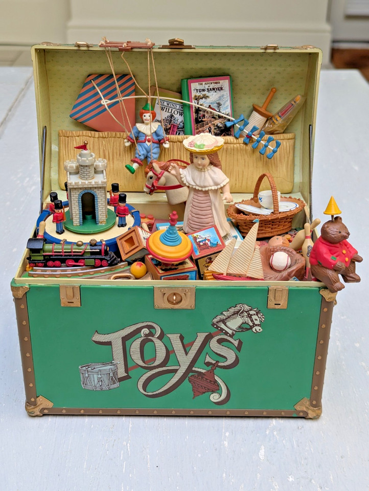A 1986 Enesco animated musical treasure chest that actually still works — nostalgia overload in a box, literally.