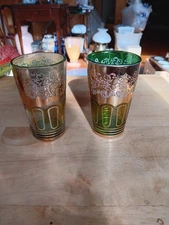TWO VTG GOLD TRIMMED MOROCCAN TEA GLASSES. MADE IN KOREA. 961