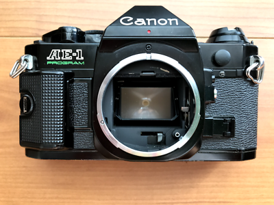 フィルムカメラ Canon AE-1 Black New FD 35-70mm f/4 Lens Exc+4] Canon AE-1 Program Black SLR & New FD 35-70mm f/3.5-4.5