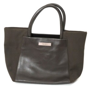 tumi brown leather