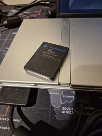 Silver Playstation 2 Slim - Includes Controller, Cables, Memory Card, Eye Toy!