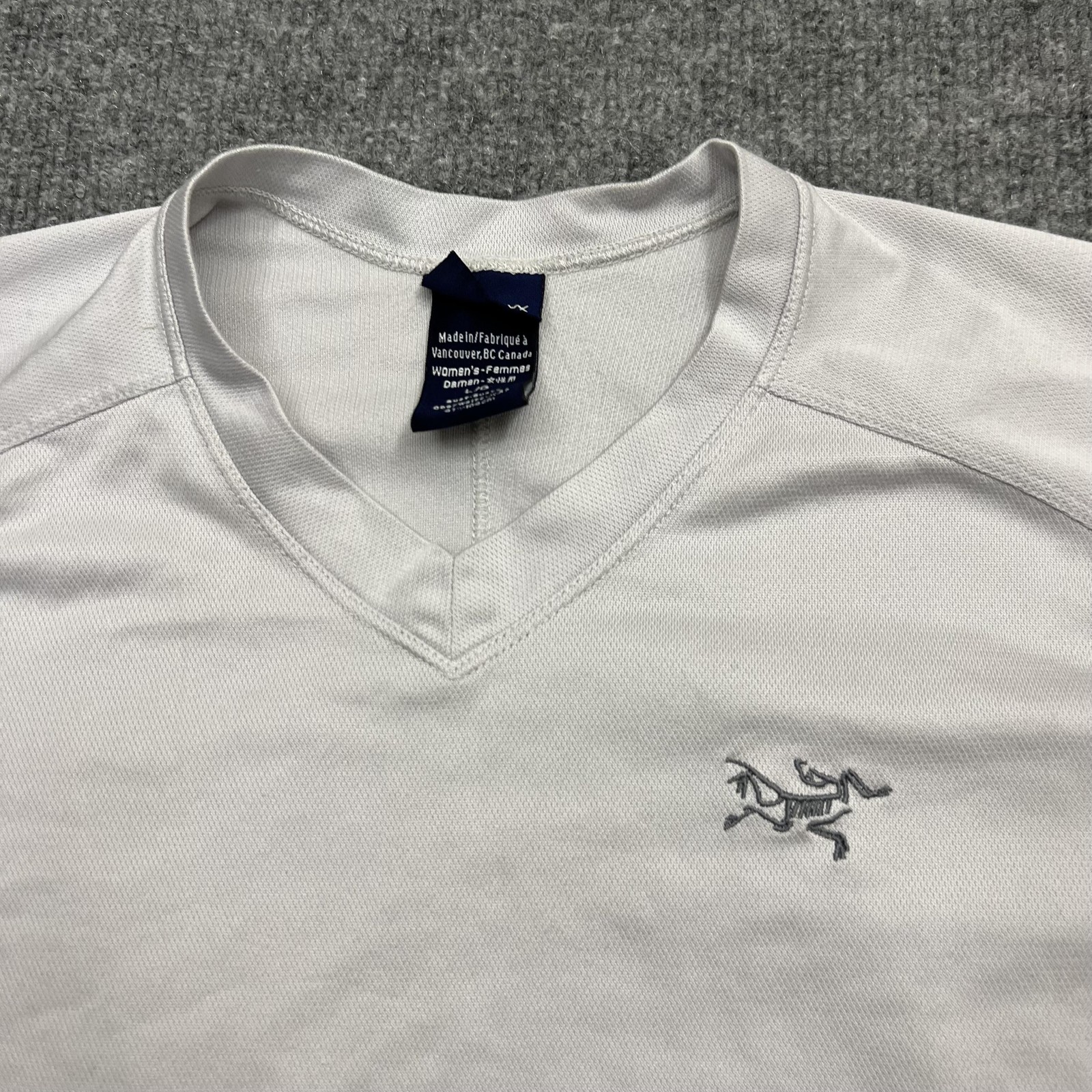 Arc'teryx Camicia Donna Grande Bianca Scollo V Manica Corta Atletica Performance Logo